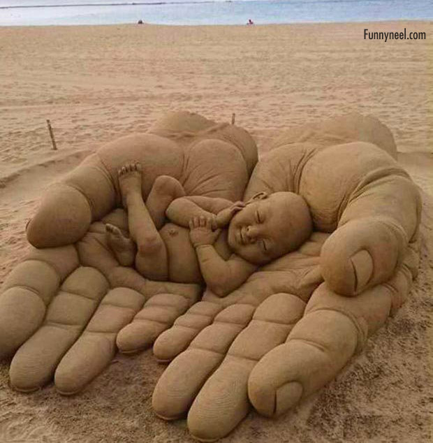 sand sculpture baby hands