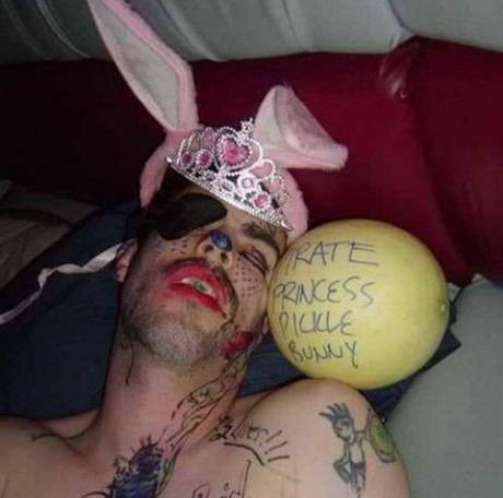 funny drunk man with rabbit cap